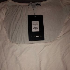 Anything but square, White Long sleeve bodysuit.